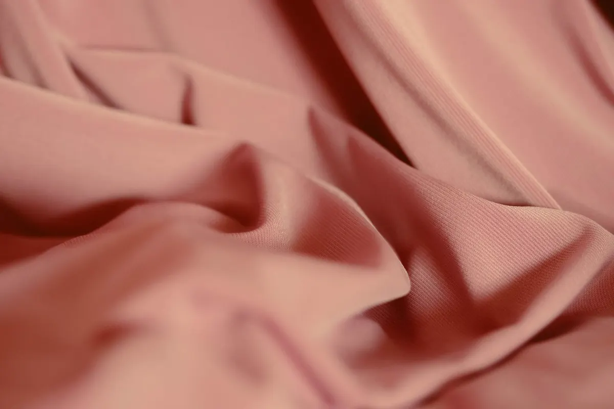Drapé rose, en illustration de « repérer un gaspilleur de temps »